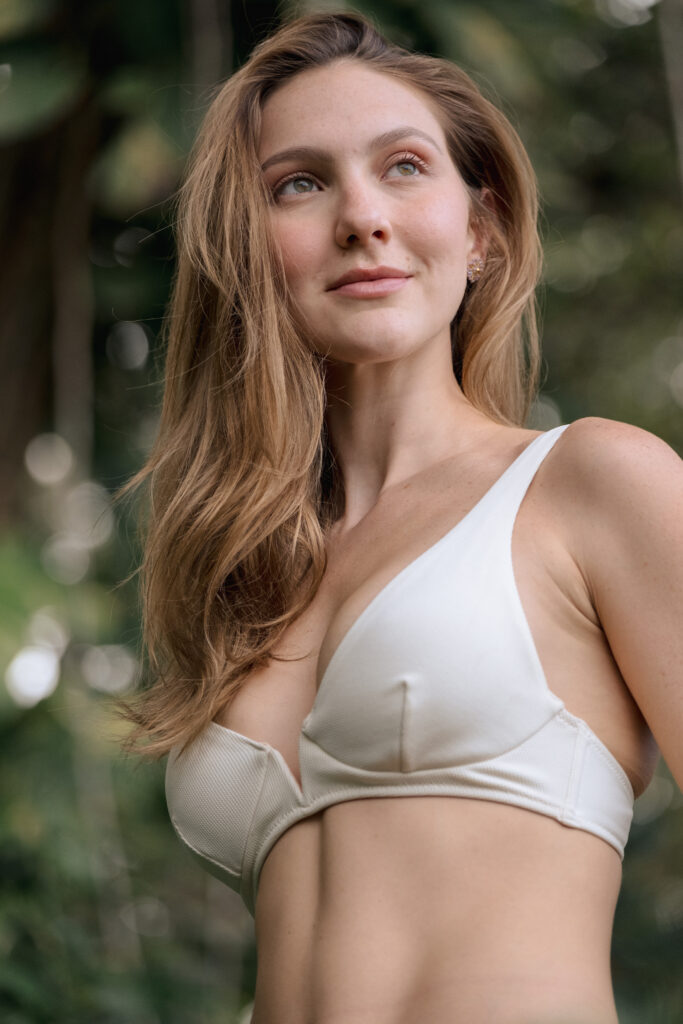 Woman reviewing Motiva Preservé breast augmentation options